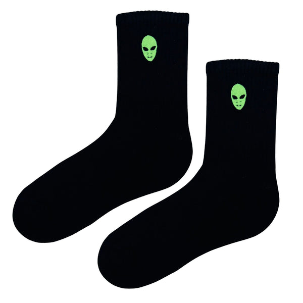 Alien Head Black Socks, featuring a neon green alien face on solid black cotton.