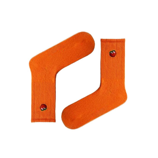 Cherry Embroidered Socks. These bold orange socks feature a tiny, detailed cherry icon stitched near the top – perfect for fans of subtle flair and fruity fun.