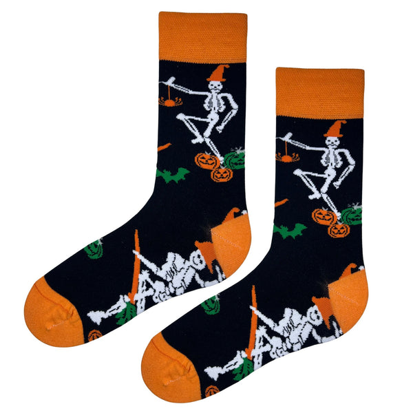 Dancing Skeleton Halloween Socks 💀🎃 — the ultimate mix of spooky and fun! Featuring white skeletons in orange hats surrounded by pumpkins and bats,