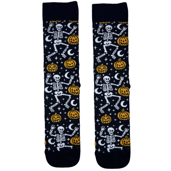 Dancing Skeleton Halloween Socks. Featuring playful white skeletons, glowing orange pumpkins, and crescent moons on a deep black background,
