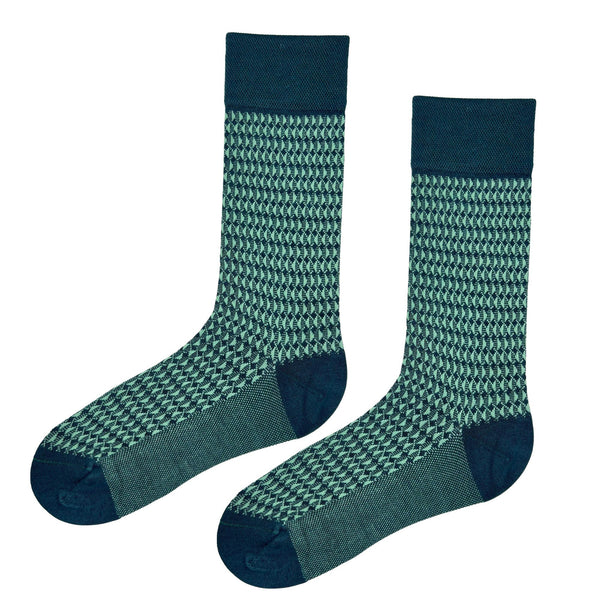 Featuring a refined dark green base with a repeating geometric design, these socks bring a modern and stylish touch to any outfit.