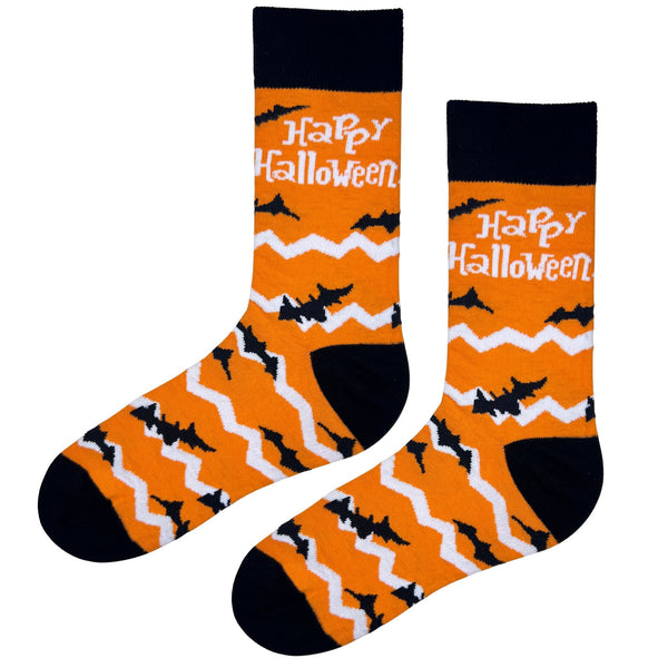 Happy Halloween Socks 🦇🎃 — a bold mix of orange, black, and white with flying bats and zigzag stripes.