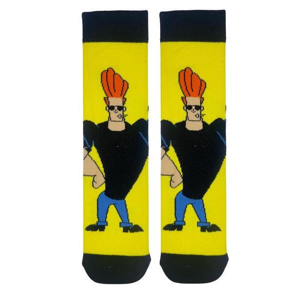 Johnny Bravo Cartoon Socks. Featuring the iconic character with his bold hairstyle, black shirt, and shades, these socks pop with a bright yellow base and black accents.