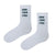 Open Your Eyes Socks. Clean, minimal, and direct, these white crew socks