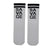 Savage Socks a clean and classic design with attitude. Featuring black "SAVAGE" text stacked vertically on a crisp white base,