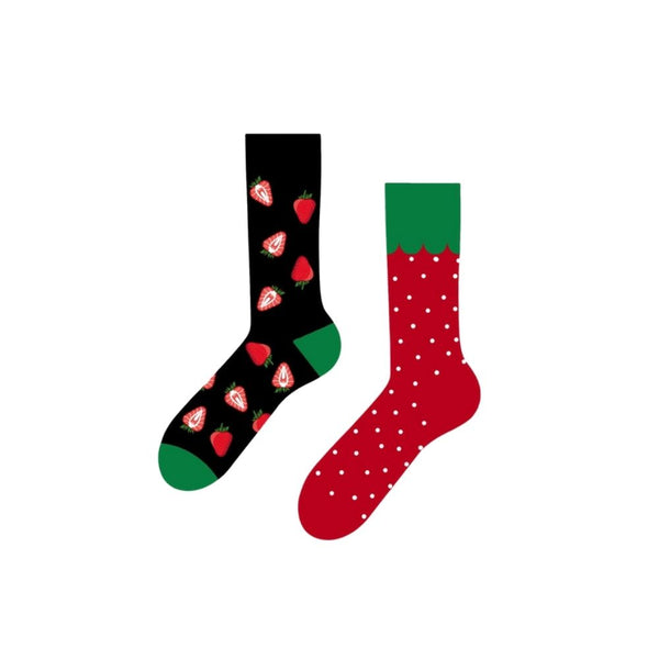 Strawberry Mismatched Socks! One sock is a black base bursting with strawberries and slices, while the other is a red sock with polka dots and a green scalloped top, mimicking a fresh berry.