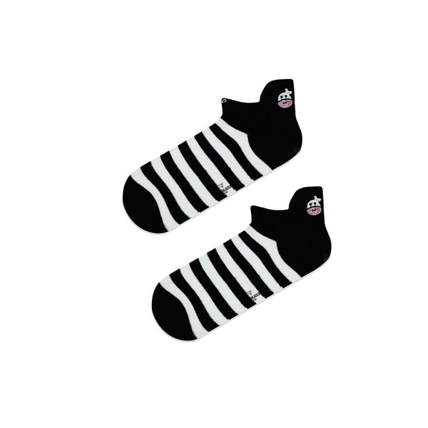 Striped Cow Ankle Socks in black and white. Featuring a cute cow face at the ankle and classic horizontal stripes,