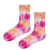 Sunset Tie-Dye Crew Socks. Designed with a vibrant blend of red, pink, orange, and white shades