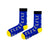 ! Featuring playful dalmatian designs on a vibrant blue background with contrasting yellow toes and black cuffs,