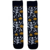  Dancing Skeleton Halloween Socks. Featuring playful white skeletons, glowing orange pumpkins, and crescent moons on a deep black background, 