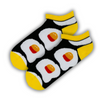 ankle socks featuring a bold fried egg pattern on a black background with yellow accents. 