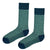  Featuring a refined dark green base with a repeating geometric design, these socks bring a modern and stylish touch to any outfit. 