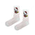 Hello Kitty embroidered socks. Featuring soft pink stripes and a detailed red-dress Hello Kitty design,