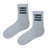  I Need Sugar Daddy Socks are the ultimate conversation starters. With bold black text on crisp white cotton, they’re perfect for those who love humor, irony, or making a statement