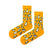  Playful Penguin Parade Socks! These vibrant yellow socks feature a waddle of adorable black and white penguins, 