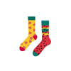  Watermelon Mismatched Socks! One sock features a vibrant yellow base covered in watermelon slices, while the other channels fruit-core fun with a red base, green toe, and scattered black seeds. 